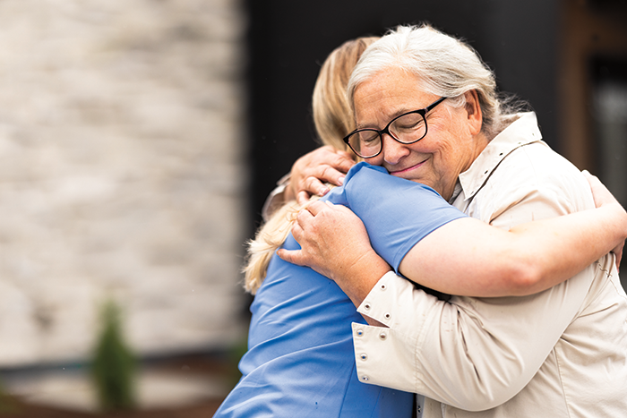 women hugging