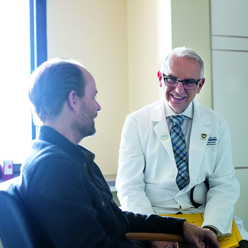 Doctor performing surgery with a team