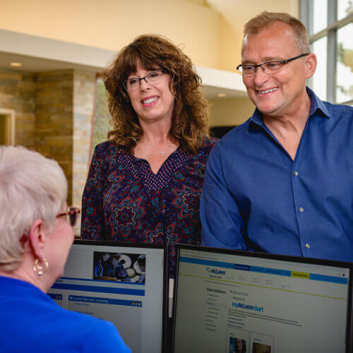 Patient and wife at Proton Therapy Center check-in